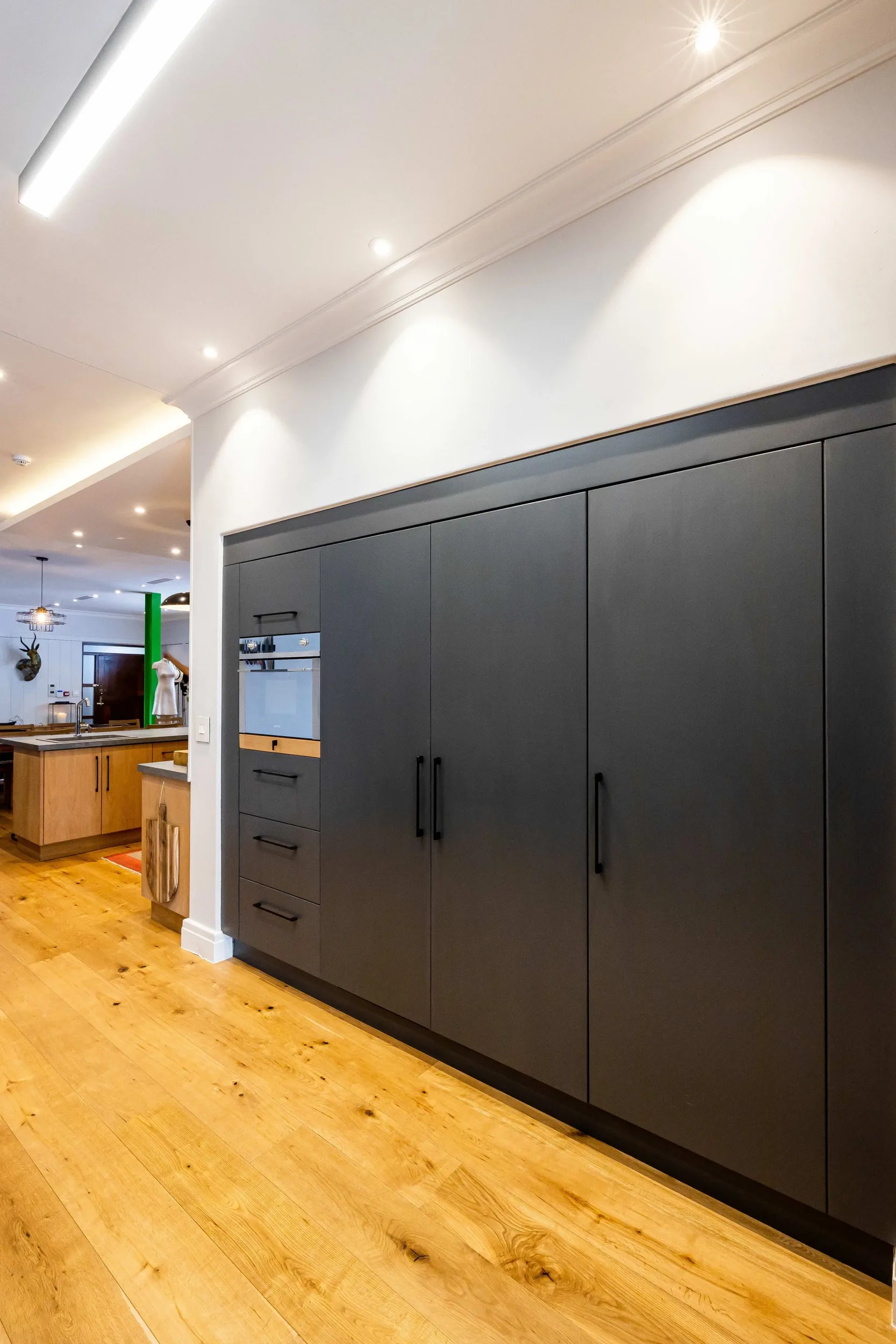 The tall kitchen cabinets