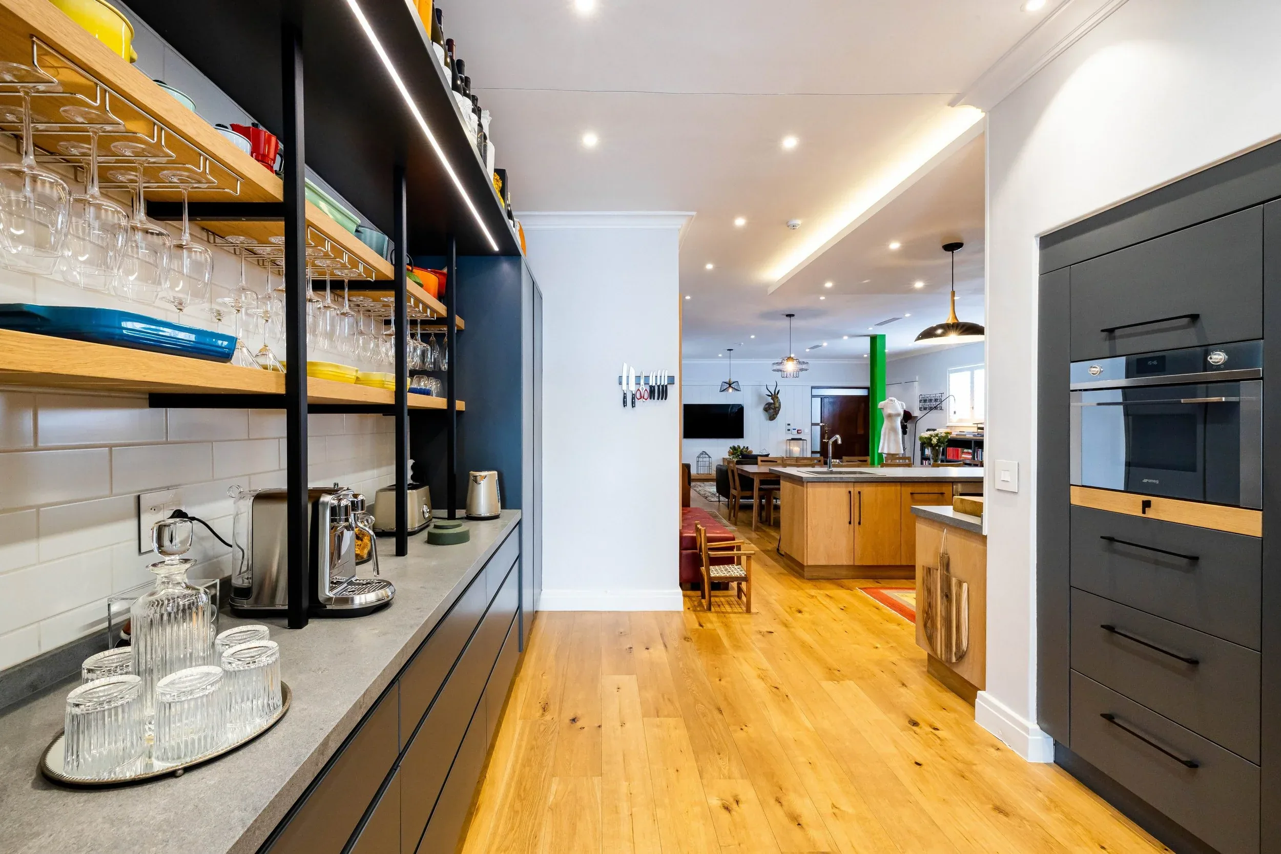 The kitchen shelves and coffee station