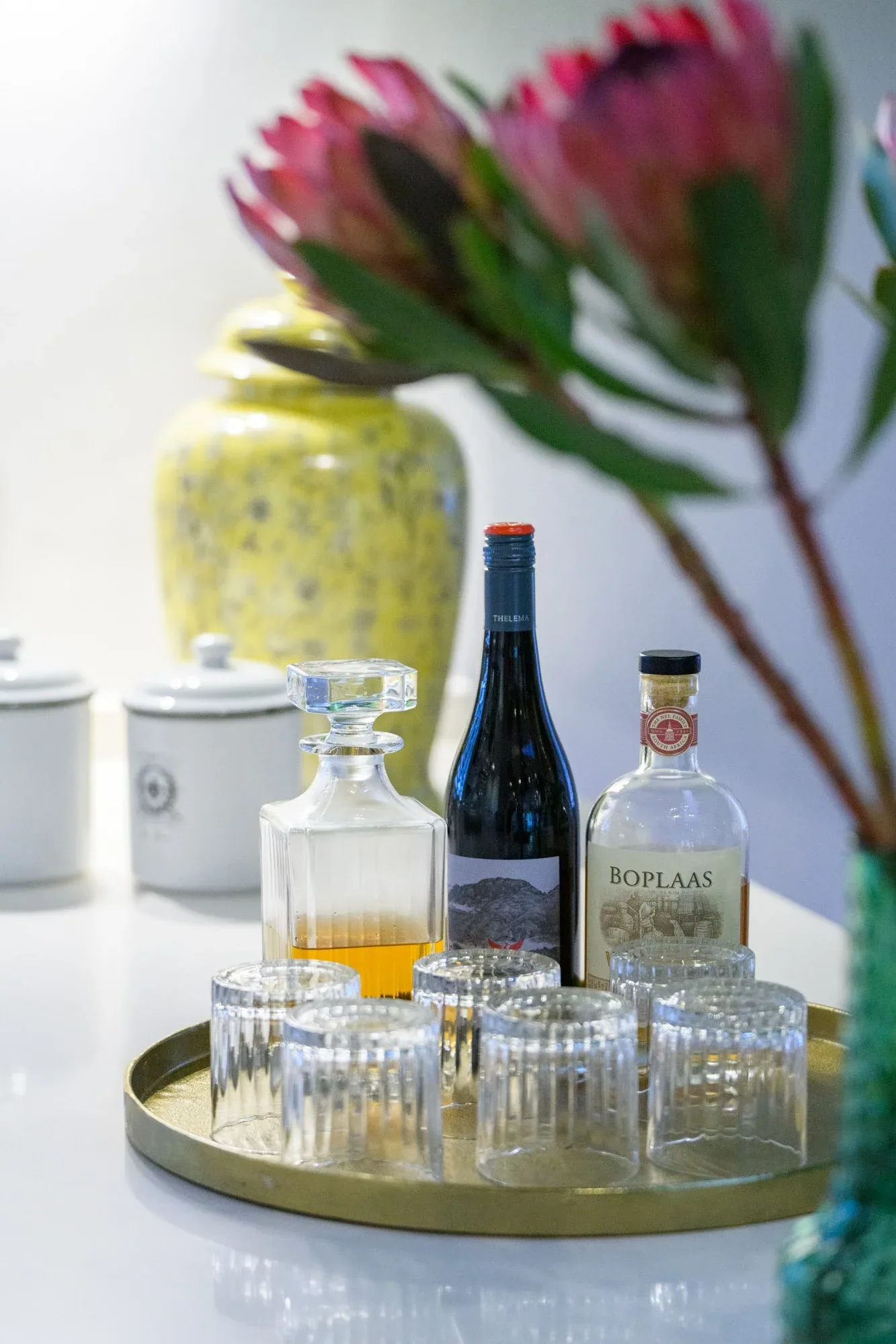 Glasses and bottles on a tray